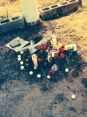 A memorial was set up near where K.C. Haggard collapsed after being stabbed.  Photo: Seth Hemmelgarn